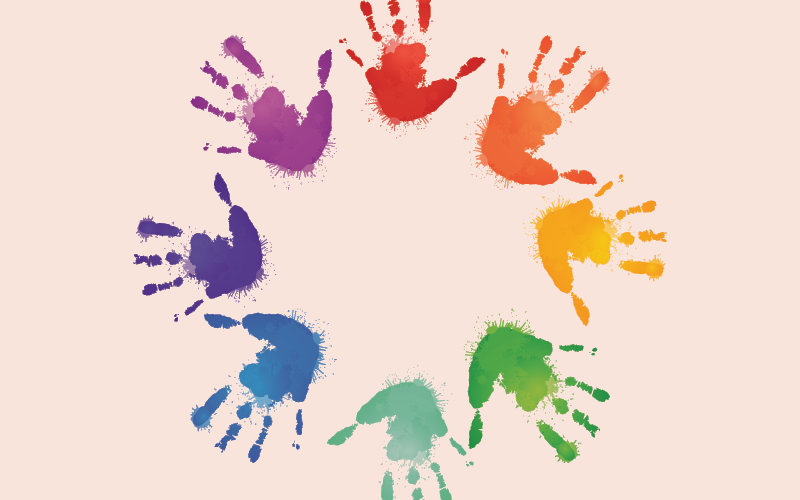 Colorful handprints in a circular pattern on a light background. Each handprint is a different color of the rainbow, arranged in a spectrum.
