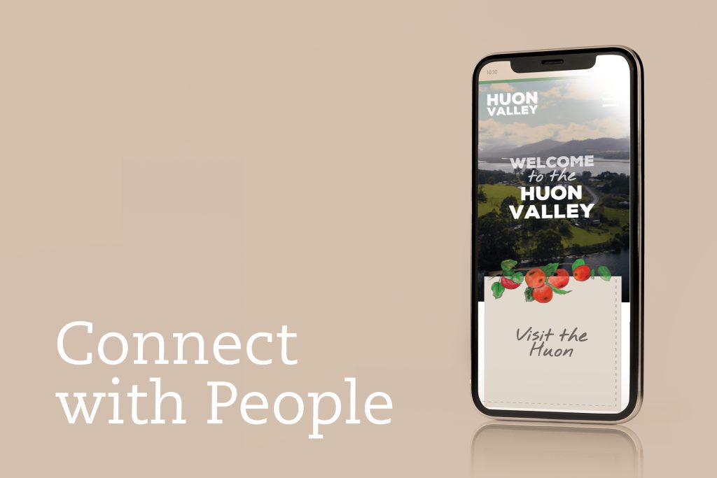 Smartphone displaying a website for Huon Valley with scenic images and text: Welcome to the Huon Valley and Visit the Huon. Background is light brown with the phrase Connect with People in large white text.