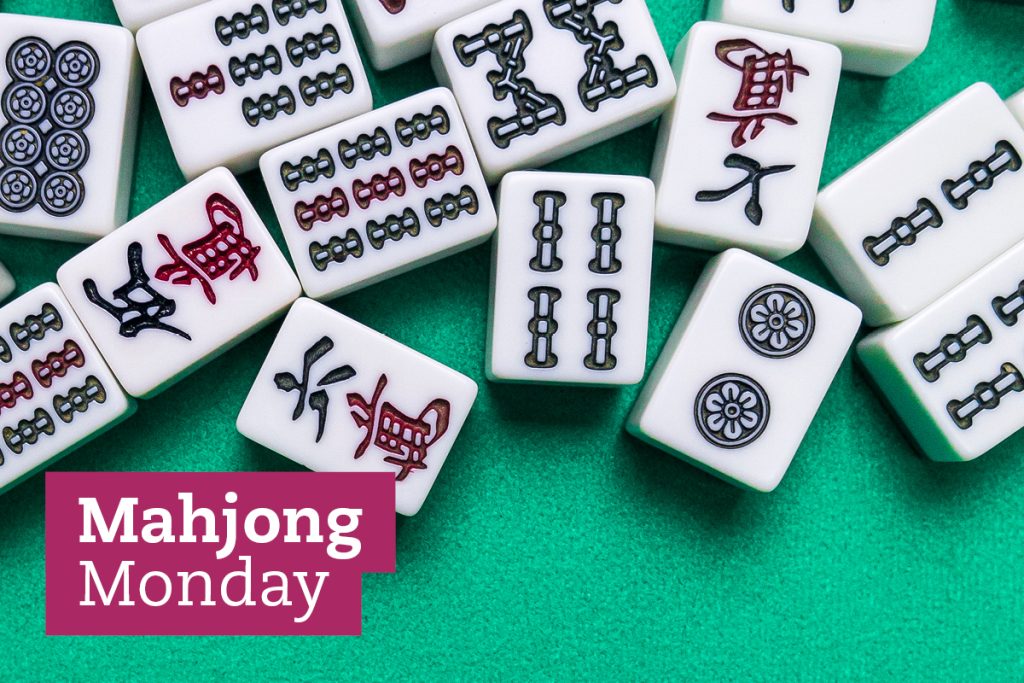 Mahjong tiles with various symbols are scattered on a green surface. A pink text box in the bottom left corner reads Mahjong Monday.