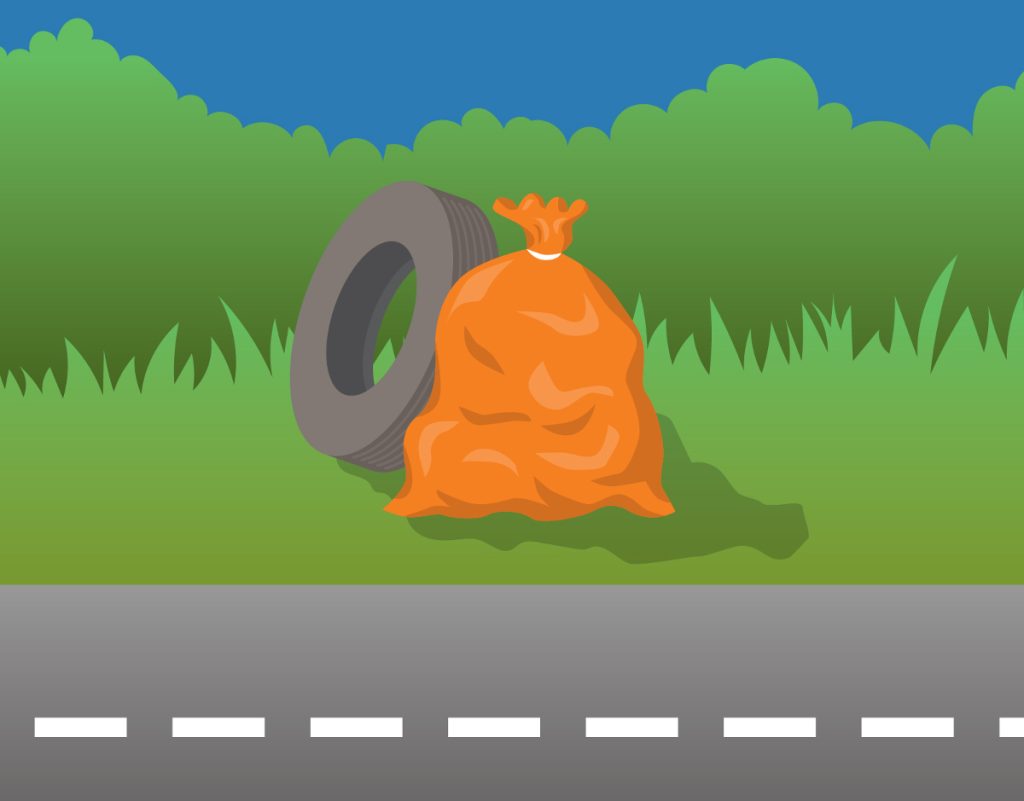 Illustration of an orange garbage bag and a discarded tire on grass beside a road with dashed lines. Green bushes are in the background under a clear blue sky.
