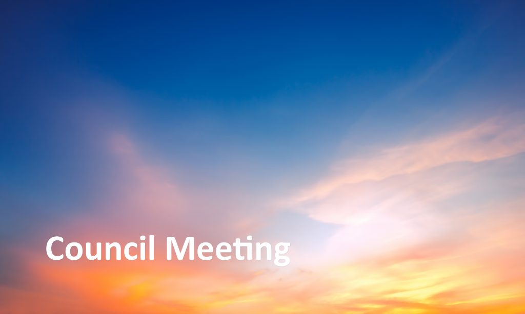 A vibrant sunset sky with hues of blue, pink, and orange. The words Council Meeting are written in white text in the lower left corner.