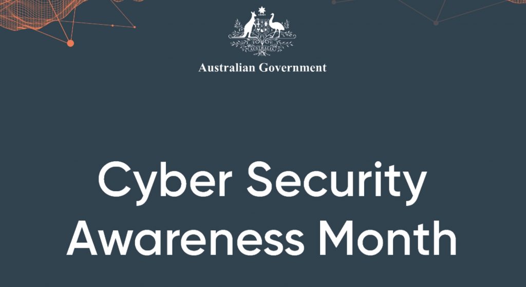 Dark blue graphic with Australian Government emblem. Text reads Cyber Security Awareness Month in white. Orange geometric lines and dots decorate the top corners.