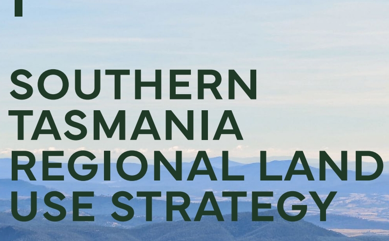 Text reads Southern Tasmania Regional Land Use Strategy over a background of blue sky and distant hills.