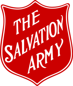 A red shield-shaped logo with white text that reads The Salvation Army in a diagonal arrangement.