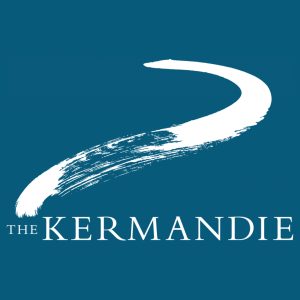 White brushstroke forming a curved path above the words THE KERMANDIE in white capital letters on a teal background.