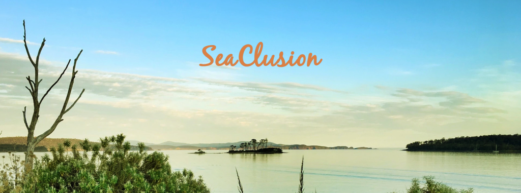 A calm lake with a small island and distant hills under a blue sky, framed by green foliage in the foreground. The word “SeaClusion” appears in orange script across the sky.