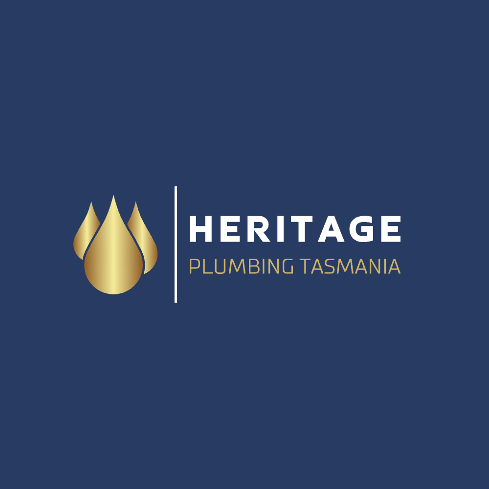 Logo for Heritage Plumbing Tasmania on a dark blue background. Features a gold water droplet design on the left and the company name in white and gold text on the right.