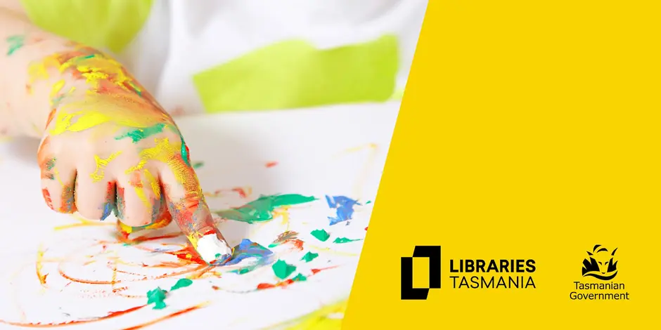 A child’s hand covered in colorful paint making finger art on paper. The left side shows the painting activity, while the right side features Libraries Tasmania and Tasmanian Government logos on a yellow background.