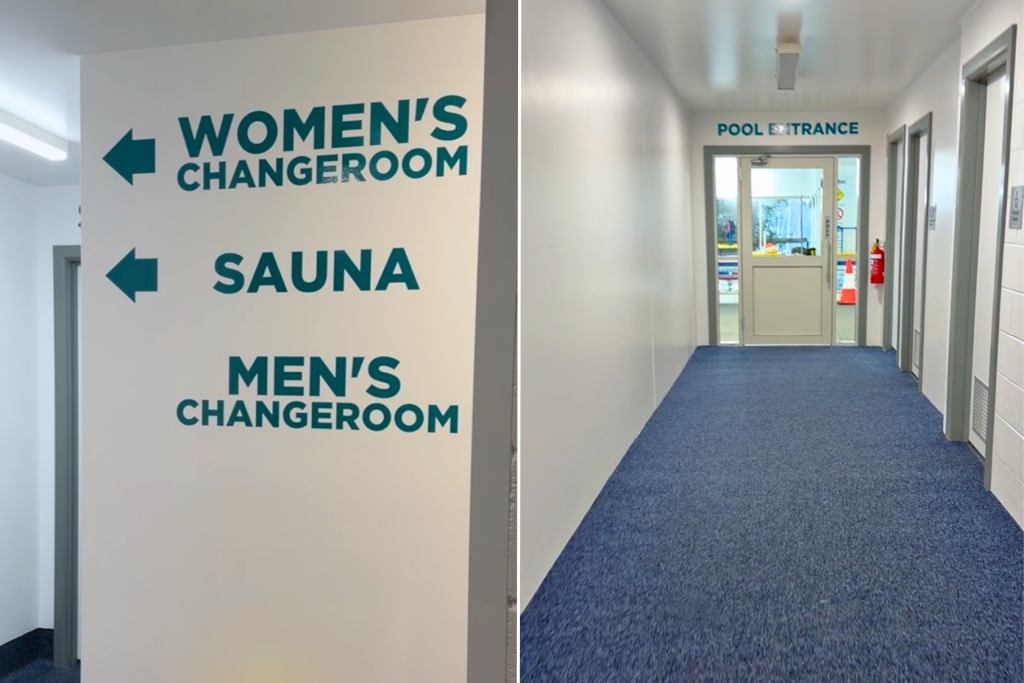 Left: A white wall with turquoise signs pointing to the womens changeroom, mens changeroom, and sauna. Right: A hallway with blue carpet leading to a glass door labeled Pool Entrance.
