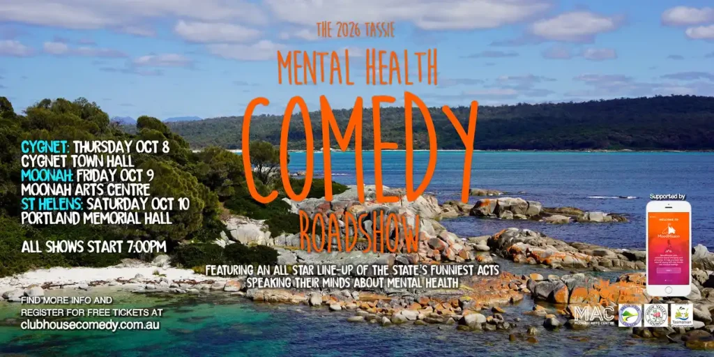 Poster for The 2024 Tassie Mental Health Comedy Roadshow over a rocky beach scene, listing show dates and locations in Cygnet, Moonah, and St Helens, with booking info and a logo for Mental Health Week.