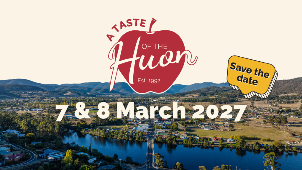 Save the date for A Taste of the Huon, taking place on 7 and 8 March 2027, shown over an aerial view of a town by a river and mountains.