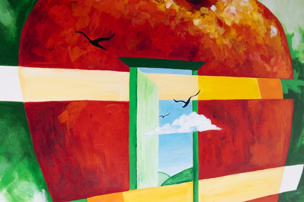 A stylized painting of an oversized red apple with an open door in the center revealing a blue sky with a cloud and silhouettes of birds.